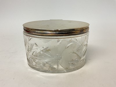 Lot 60 - Good quality cut glass biscuit box of oval form with silver plated mounts, 16cm x 12cm x 10cm high