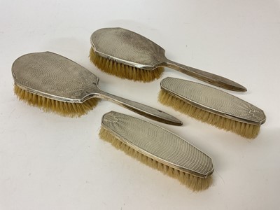 Lot 73 - Four peice silver dressing set with engine turned Art Deco decoration (Birmingham 1936-37)