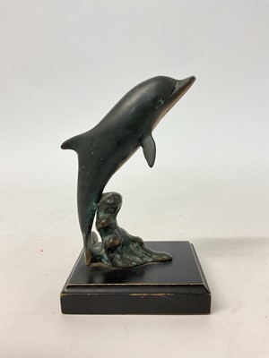 Lot 64 - Contemporary bronze sculpture of a dolphin rising from the waves, on ebonised plinth, 15.5cm high overall