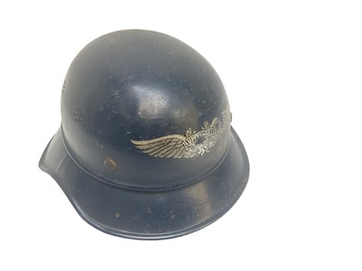 Lot 737 - Second World War Nazi Luftschutz helmet with original paint, transfer badge and lining.