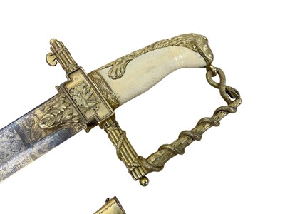 Lot 950 - Fine and rare Lloyd's Patriotic Fund sword of 100 Guinea value, awarded to Henry Lambert Esq. Captain of H.M.S. St. Fiorenzo, presented in 1805, blad...