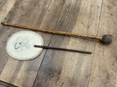 Lot 145 - 19th century embroidered silk face guard and a carved bamboo cane