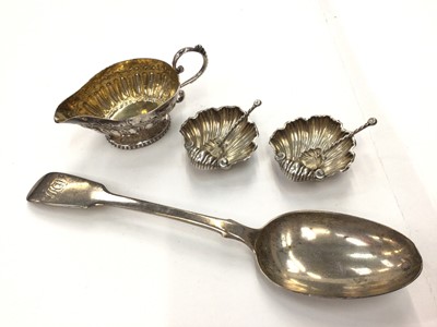 Lot 95 - Georgian silver table spoon, antique silver cream jug with gilt interior and a pair of Edwardian silver shell shaped salts with similar style 'sterling' salt spoons