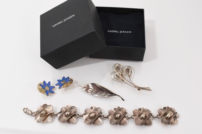 Lot 105 - Group of Norwegian silver and similar style jewellery to include a David Anderson silver leaf brooch, N.A. Jørgensen silver and enamel spray brooch, silver abstract panel bracelet and a pair of...