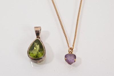 Lot 110 - 9ct gold mounted amethyst heart shaped pendant on chain and a silver mounted pear shaped peridot pendant