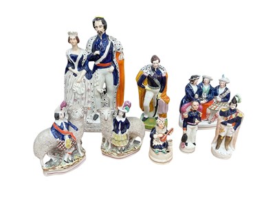 Lot 15 - Good group of 19th century Staffordshire pottery figures to include Queen & King of Sardinia, Napoleon, Turkman figural inkwell etc (8)