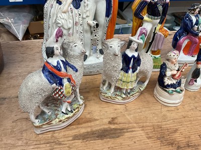 Lot 15 - Good group of 19th century Staffordshire pottery figures to include Queen & King of Sardinia, Napoleon, Turkman figural inkwell etc (8)