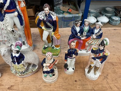 Lot 15 - Good group of 19th century Staffordshire pottery figures to include Queen & King of Sardinia, Napoleon, Turkman figural inkwell etc (8)