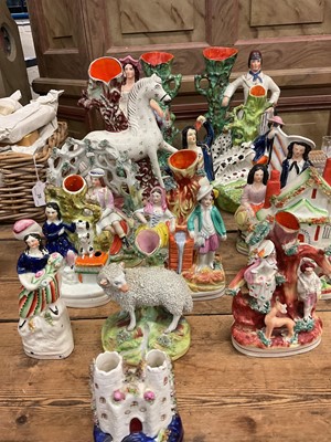 Lot 41 - Group of 19th century Staffordshire pottery flatback figures, figure groups and spill vases (14)