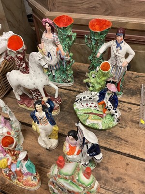 Lot 41 - Group of 19th century Staffordshire pottery flatback figures, figure groups and spill vases (14)