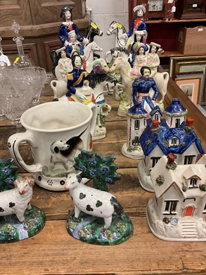 Lot 45 - Group of Staffordshire style pottery figures to include Prince Albert, Duke of Cambridge, Duchess, surprise mug etc (14)