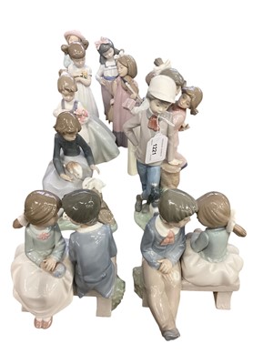 Lot 1221 - Group of ten Nao porcelain figurines and a Lladro porcelain figurine (11)