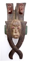 Lot 1069 - 19th century African carved wooden ceremonial...