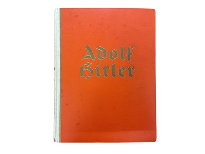 Lot 891 - 1930s German Adolf Hitler photograph cigarette card album. The album complete with all original black and white laid-in photographic cards.