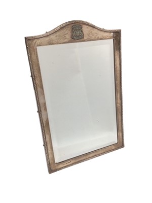 Lot 121 - Silver framed easel mirror with applied crest (Sheffield import marks 1968), 36cm x 23.5cm overall