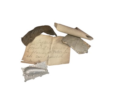 Lot First World War Zeppelin interest- fragment of L15 damaged at Stowmarket on 31st March 1916, together with fragments of L31 with hand written note (2).