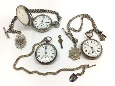 Lot 130 - Silver cased full hunter pocket watch with silver Albert chain and fob, together with two other silver cased pocket watches and chains