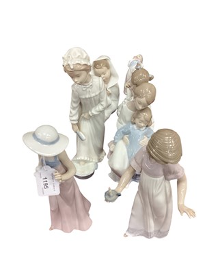 Lot 73 - Seven Nao porcelain figures including girl with dog and girl with chamberstick