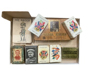 Lot Group of six First World War related matchbook covers, together with a First World War card game and related tins.