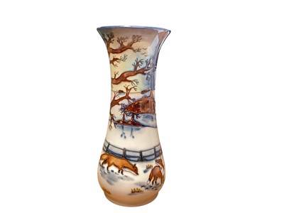 Lot 1211 - Moorcroft pottery vase decorated with foxes in a winter landscape, dated 99, 20.5cm high