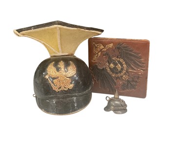 Lot Unusual Imperial German miniature czapska, together with a miniature picklehaube and a folding leather coin purse with Imperial German arms (3).