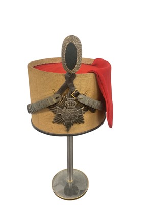 Lot 825 - Scarce Imperial German Saxony Reserve Officers ersatz busby with canvas covered body, silvered and gilt two part helmet plate, silvered chin scales, silver bullion and red felt bag and original...