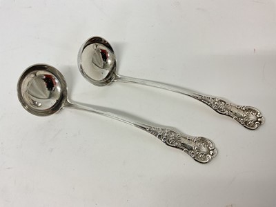 Lot 43 - Pair of early Victorian Scottish silver King's pattern cream ladles