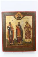 Lot 1090 - 19th century Russian Icon with three saints...