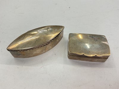 Lot 1091 - Victorian silver snuff box of plain navette form with rope work border, together with an Edwardian silver snuff box (2)