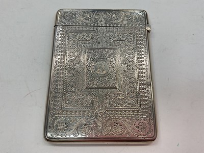 Lot 1093 - Victorian silver card case with engraved Arabesque decoration surrounding an image of Shakespeare