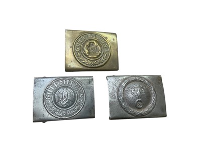 Lot 712 - Nazi N.S.K.K. belt buckle, a Nazi Wehrmacht belt buckle and an Imperial German buckle (3).