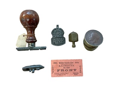 Lot 881 - Scarce original First World War ticket 'London to the Front' 1915, together with a document stamp with label stating it was used in Alsace during the Great War, Trench Art cap and other items.