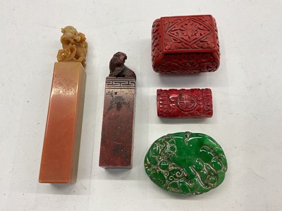 Lot 354 - Two Chinese carved hard stone seals, two other carved plaques and a small cinnabar box with cover (5)