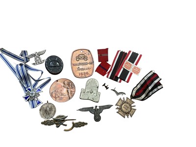 Lot 719 - Group of Nazi German medals and badges to include a Cross of Honour of the German Mother, 1939 Bar to 1914 Iron Cross and others, both original and post war copies noted.