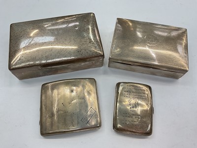 Lot 1101 - 1920s silver cigarette box and two silver cigarette cases (various dates and makers), together with a 1940s silver cigarette box (marks rubbed) (4)