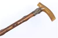 Lot 1098 - Victorian rhinoceros horn-handled cane, the...