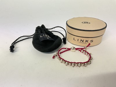 Lot 117 - Links of London bracelet formed as skulls, in original pouch and card box