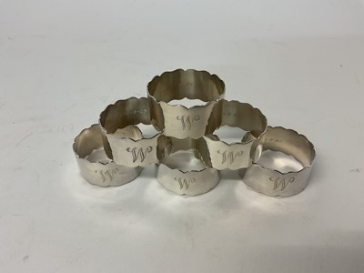 Lot 33 - Set of six Mappin & Webb silver napkin rings with engraved initial 'W'