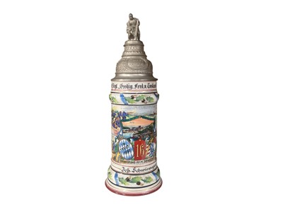 Lot Imperial German military porcelain stein with hinged pewter lid with soldier with wounded and lion mounts, transfer and painted military decoration named to ' Joh.Schwiewager, Kyle.hay.16.Inft.R...