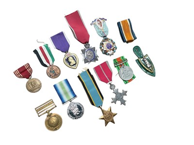 Lot 761 - Group of various medals to include Second World War Defence medal, United Nations Korea medal, American Purple Heart, copy Air Crew Europe Star, copy South Atlantic medal and copy M.B.E. And oth...