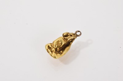 Lot 227 - Gold nugget with suspension loop, 18mm