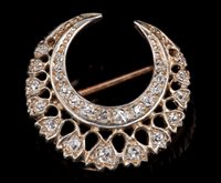 Lot 656 - Victorian diamond crescent brooch with a...