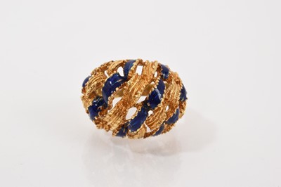 Lot 235 - Gold and blue enamel woven ribbon design bombé ring (stamped 18K)