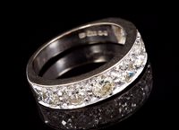 Lot 668 - Diamond eternity ring with seven brilliant cut...