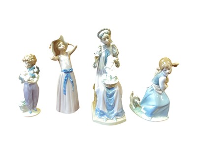 Lot 1252 - Four Lladro porcelain figures including Sewing A Trousseau, all boxed