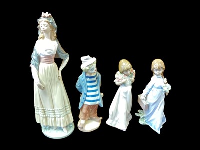 Lot 1254 - Four Lladro porcelain figures including Goya Lady and a Clown, all boxed