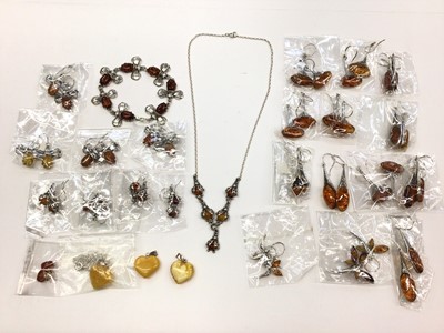 Lot 192 - Collection of silver and white metal mounted amber jewellery, mostly new in packets