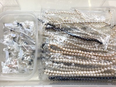 Lot 194 - Group of cultured pearl single strand necklaces and bracelets with silver (925) clasps and pairs of cultured pearl silver (925) stud earrings, various colours, mostly new in packets