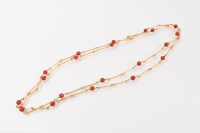 Lot 214 - 18ct gold bar link chain necklace interspaced with coral beads, 102cm long