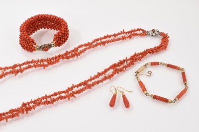 Lot 215 - Victorian carved coral and yellow metal mounted bracelet, pair of coral drop earrings, coral bead multi-strand bracelet with silver clasp and a coral necklace